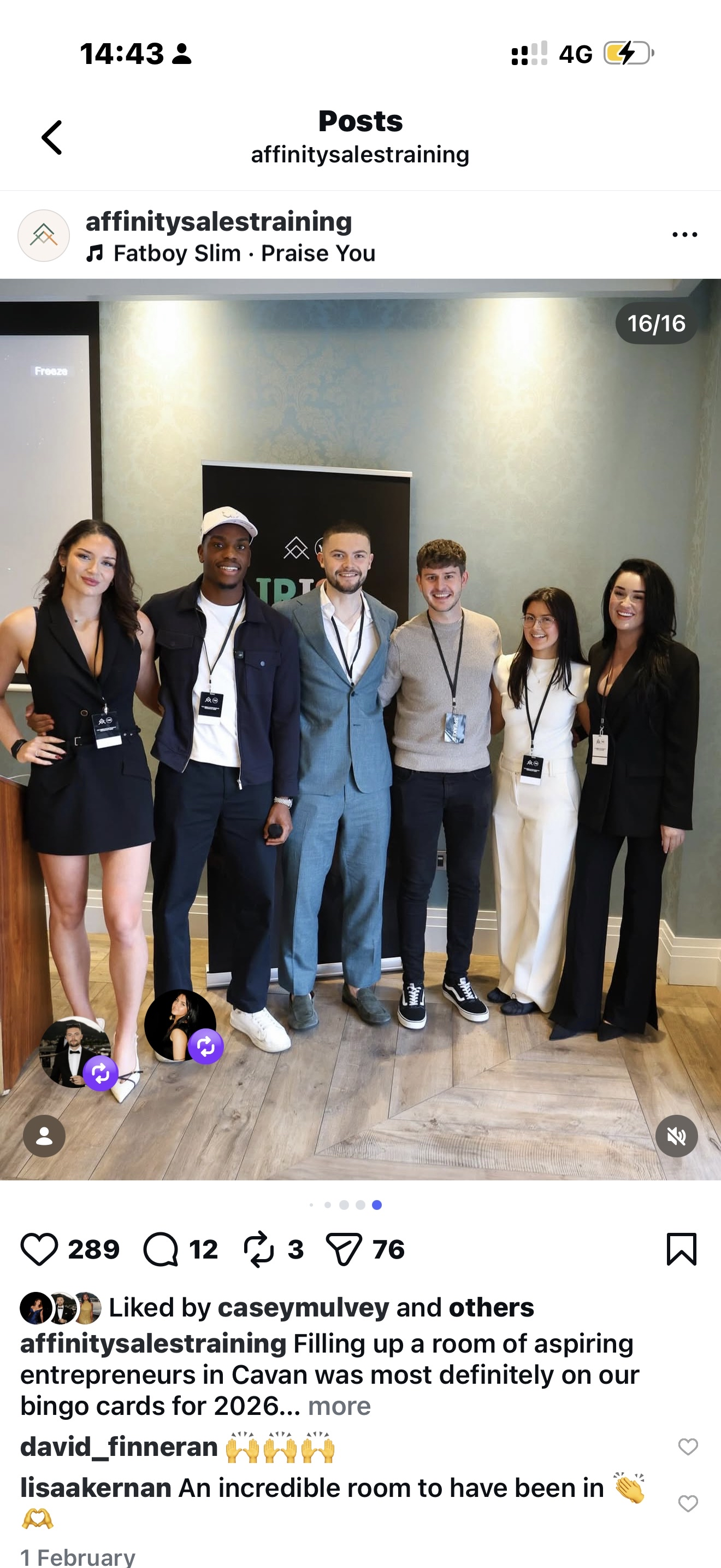 Large group photo with mountains in background